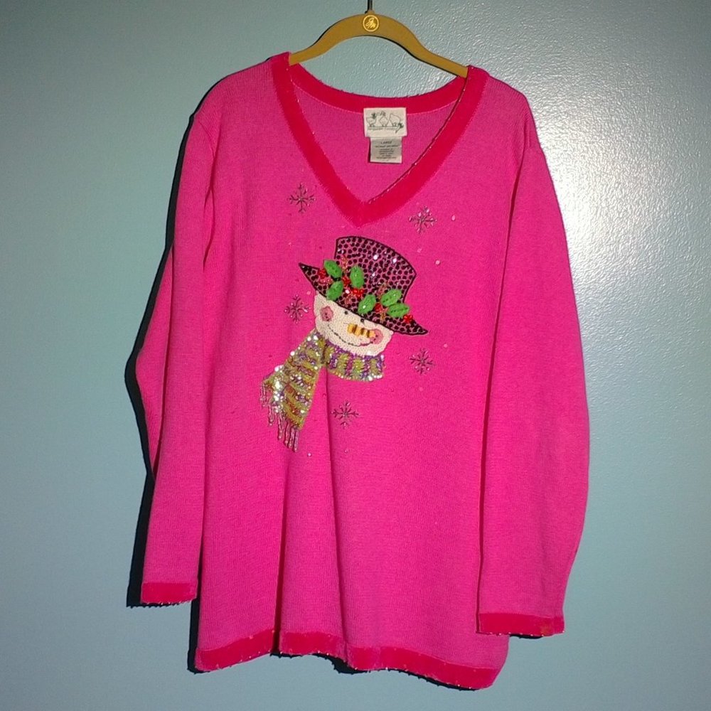 L pink V-neck sweater with sequined snowman